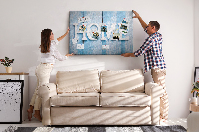 Bacheca in sughero con scritta decorativa Home su sfondo blu