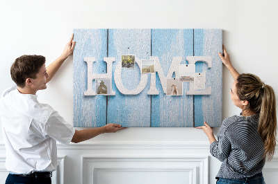 Bacheca in sughero con scritta decorativa Home su sfondo blu