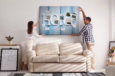 Bacheca in sughero con scritta decorativa Home su sfondo blu