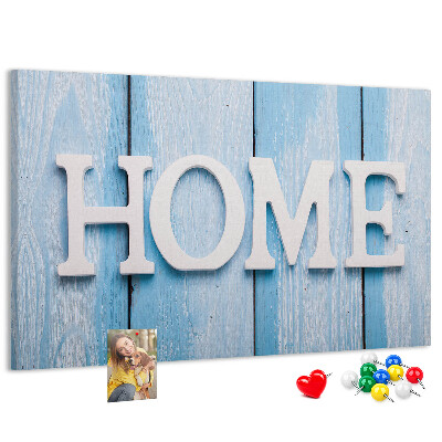 Bacheca in sughero con scritta decorativa Home su sfondo blu