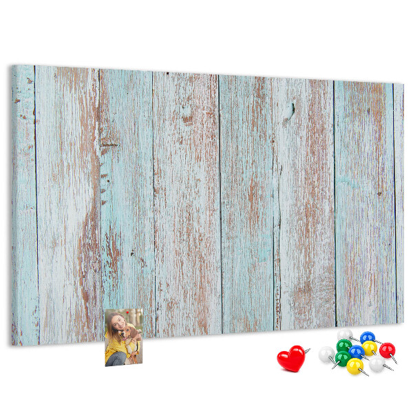 Bacheca in sughero con stampa di vecchie tavole in diverse tonalità di blu