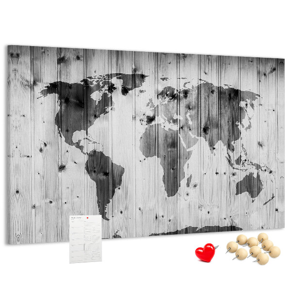 Lavagna di sughero con mappa del mondo su sfondo di assi di legno