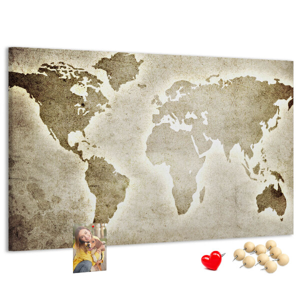 Bacheca in sughero con stampa di una vecchia mappa del mondo sullo sfondo