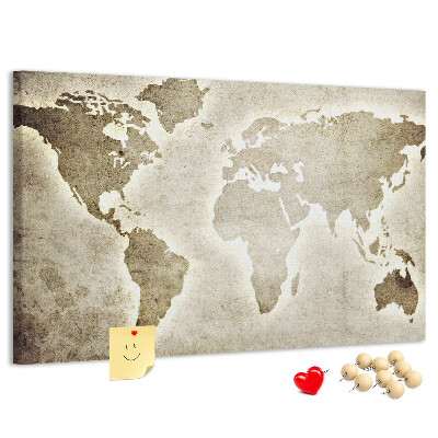 Bacheca in sughero con stampa di una vecchia mappa del mondo sullo sfondo