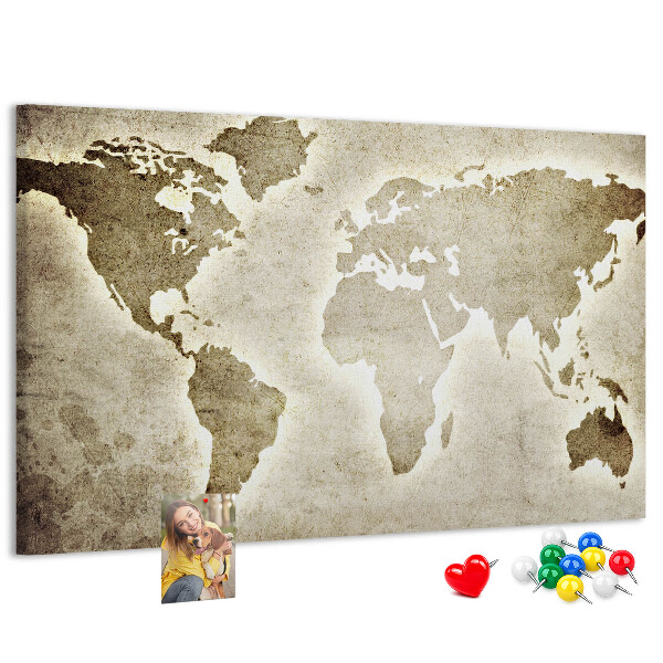 Bacheca in sughero con stampa di una vecchia mappa del mondo sullo sfondo