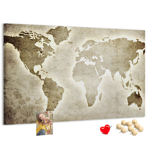 Bacheca in sughero con stampa di una vecchia mappa del mondo sullo sfondo