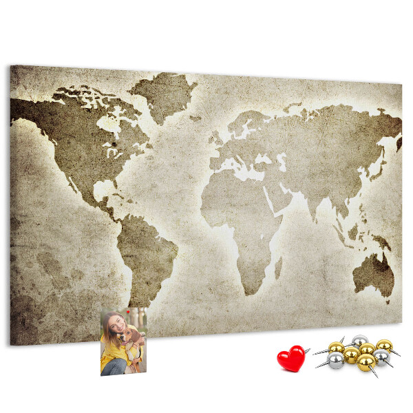 Bacheca in sughero con stampa di una vecchia mappa del mondo sullo sfondo