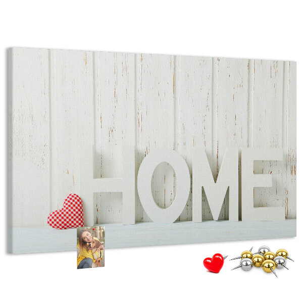Bacheca in sughero con scritta HOME elegante su sfondo bianco