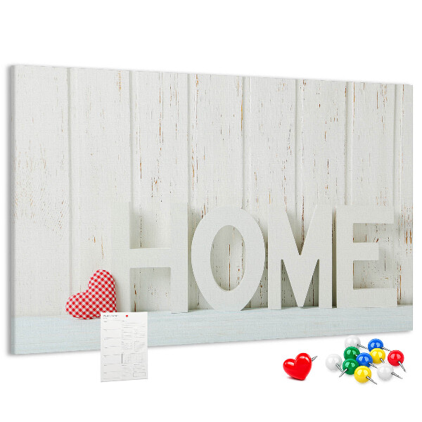 Bacheca in sughero con scritta HOME elegante su sfondo bianco
