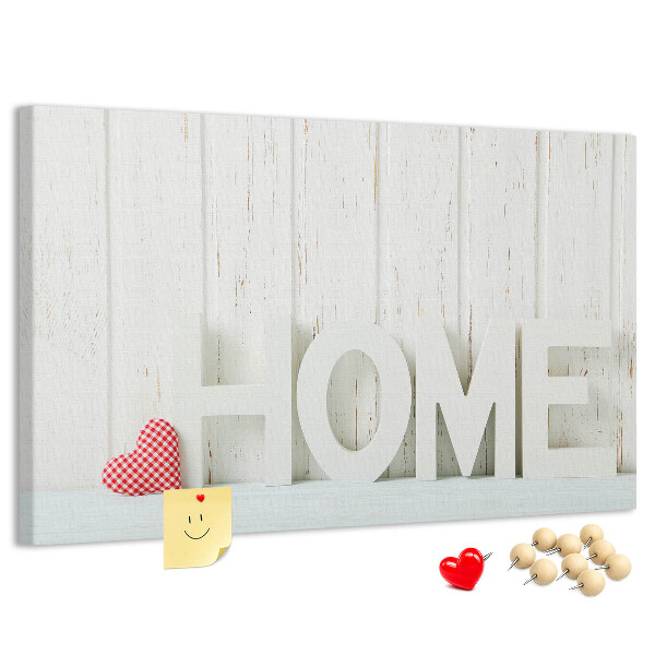 Bacheca in sughero con scritta HOME elegante su sfondo bianco