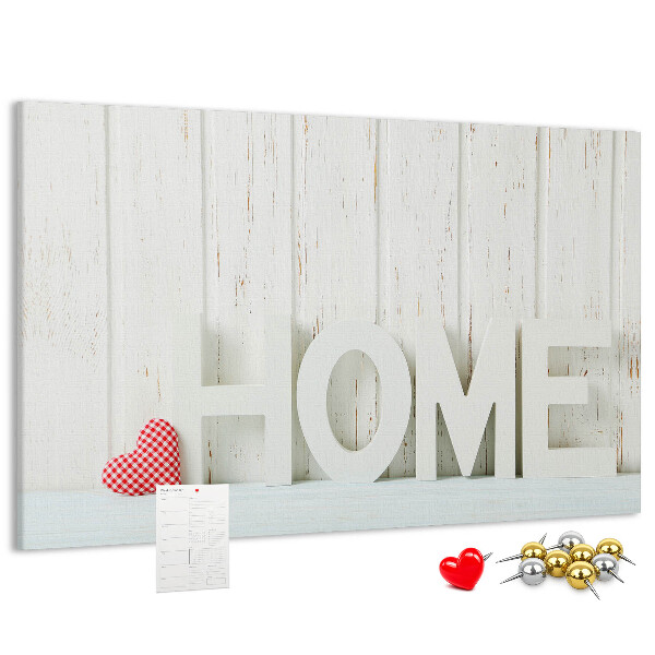 Bacheca in sughero con scritta HOME elegante su sfondo bianco