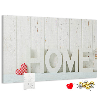 Bacheca in sughero con scritta HOME elegante su sfondo bianco