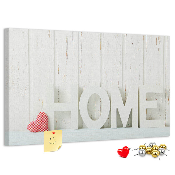 Bacheca in sughero con scritta HOME elegante su sfondo bianco