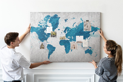 Bacheca in sughero con incisione di una mappa del mondo in diverse tonalità di blu