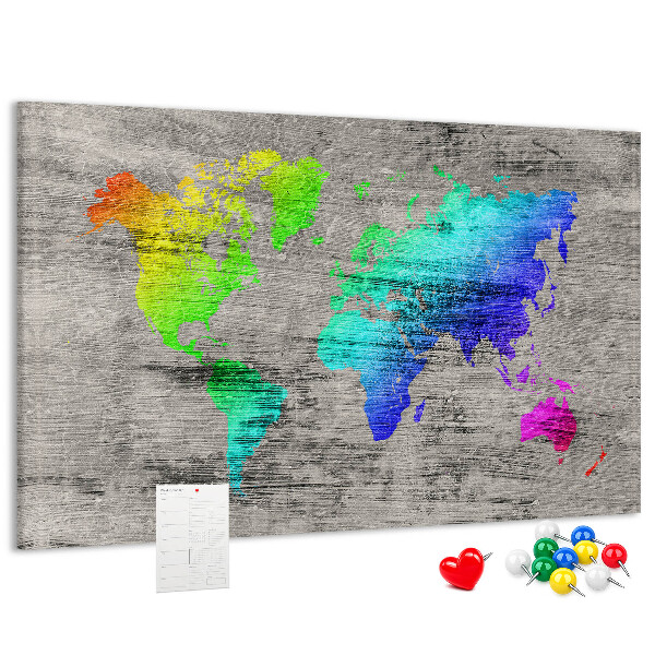 Lavagna di sughero mappa del mondo colorata su sfondo grigio