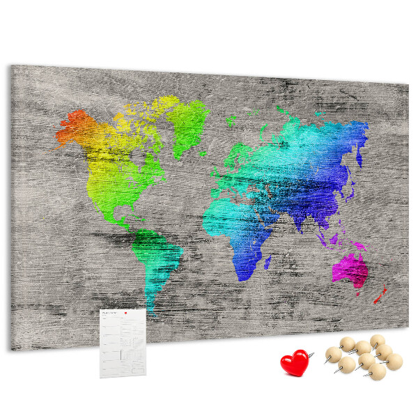 Lavagna di sughero mappa del mondo colorata su sfondo grigio