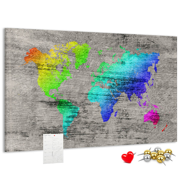 Lavagna di sughero mappa del mondo colorata su sfondo grigio