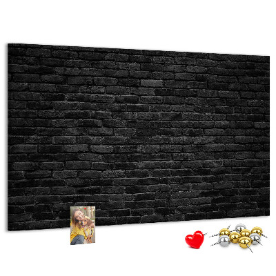 Lavagna di sughero con texture di muro in mattoni scuri dalla superficie ruvida