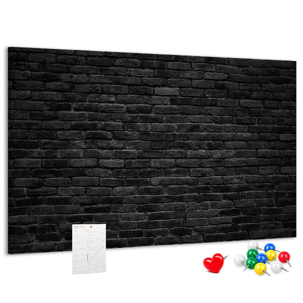 Lavagna di sughero con texture di muro in mattoni scuri dalla superficie ruvida