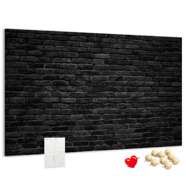 Lavagna di sughero con texture di muro in mattoni scuri dalla superficie ruvida