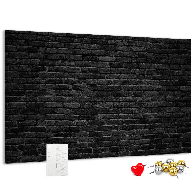 Lavagna di sughero con texture di muro in mattoni scuri dalla superficie ruvida