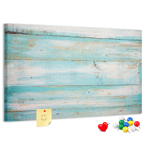 Lavagna di sughero con tavola di legno nelle tonalità del blu