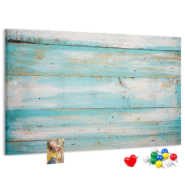 Lavagna di sughero con tavola di legno nelle tonalità del blu