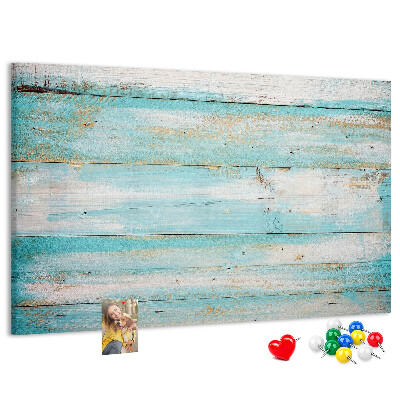 Lavagna di sughero con tavola di legno nelle tonalità del blu