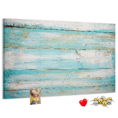 Lavagna di sughero con tavola di legno nelle tonalità del blu
