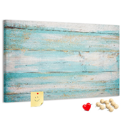 Lavagna di sughero con tavola di legno nelle tonalità del blu