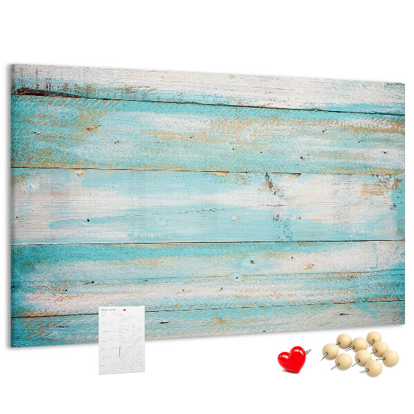 Lavagna di sughero con tavola di legno nelle tonalità del blu