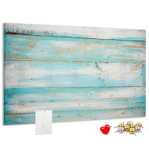 Lavagna di sughero con tavola di legno nelle tonalità del blu