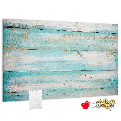 Lavagna di sughero con tavola di legno nelle tonalità del blu