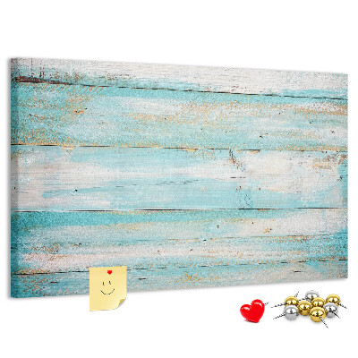 Lavagna di sughero con tavola di legno nelle tonalità del blu