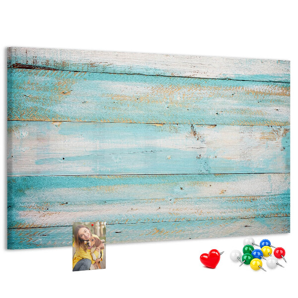Lavagna di sughero con tavola di legno nelle tonalità del blu
