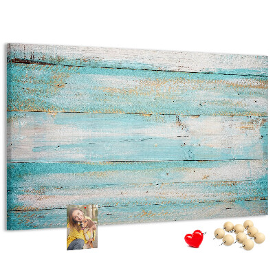 Lavagna di sughero con tavola di legno nelle tonalità del blu