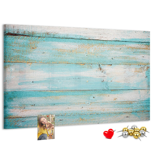 Lavagna di sughero con tavola di legno nelle tonalità del blu
