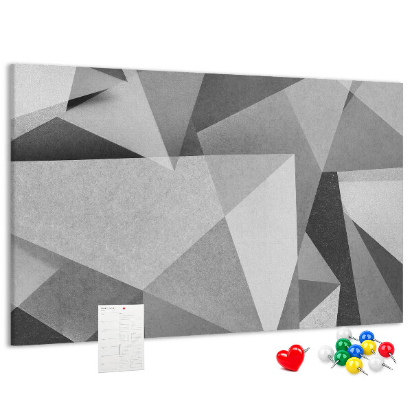 Lavagna di sughero con stampa di forme geometriche astratte grigie e nere