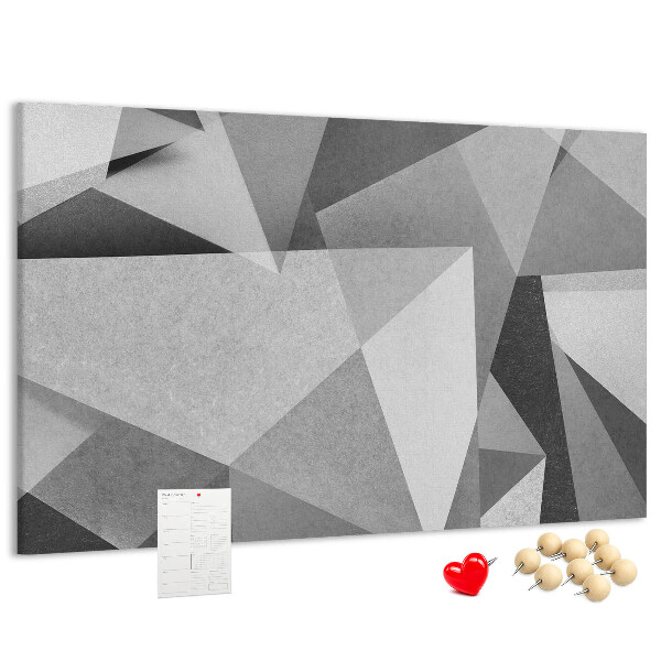 Lavagna di sughero con stampa di forme geometriche astratte grigie e nere