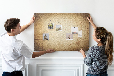 Lavagna di sughero con stampa di antica mappa e punti segnati