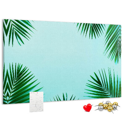 Bacheca in sughero con stampa di foglie tropicali su sfondo blu