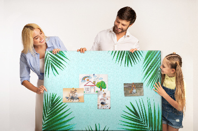 Bacheca in sughero con stampa di foglie tropicali su sfondo blu
