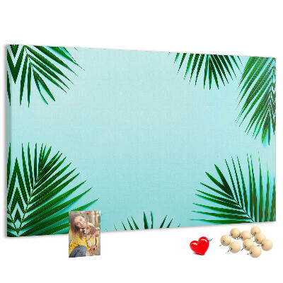 Bacheca in sughero con stampa di foglie tropicali su sfondo blu