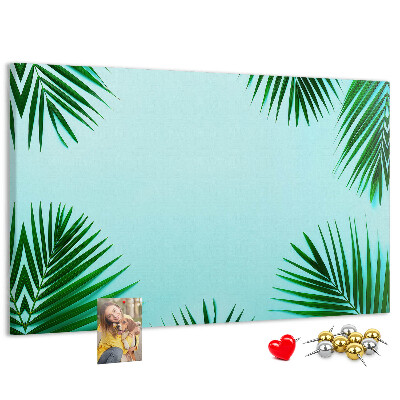 Bacheca in sughero con stampa di foglie tropicali su sfondo blu
