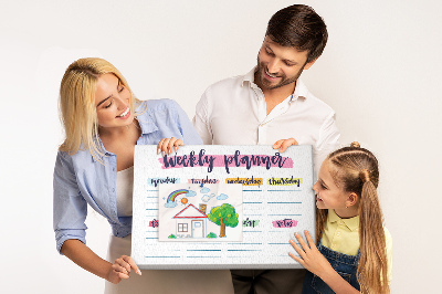 Agenda settimanale con dettagli colorati e lavagna di sughero
