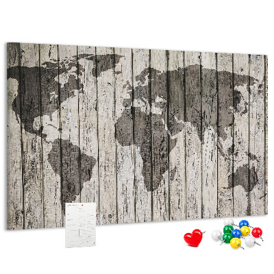 Bacheca in sughero con stampa di una mappa del mondo su sfondo di assi di legno