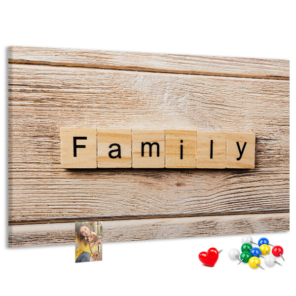 Bacheca in sughero con stampa decorativa di famiglia su sfondo di tavola in legno