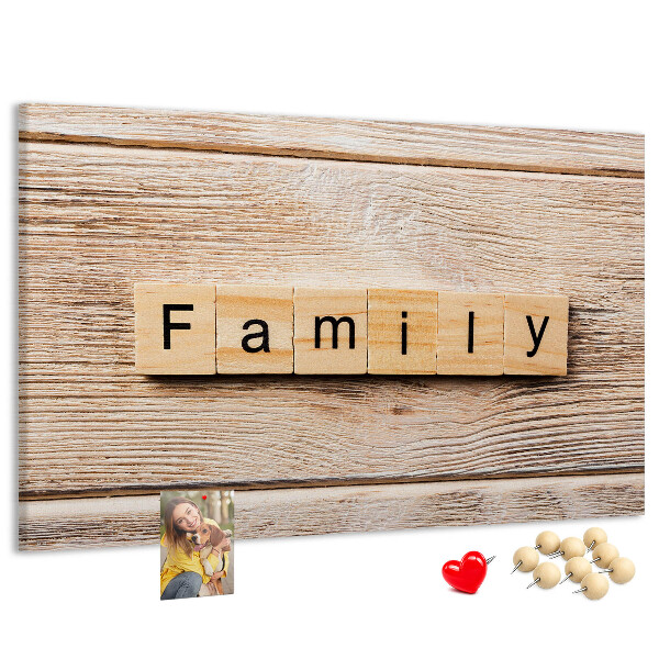 Bacheca in sughero con stampa decorativa di famiglia su sfondo di tavola in legno