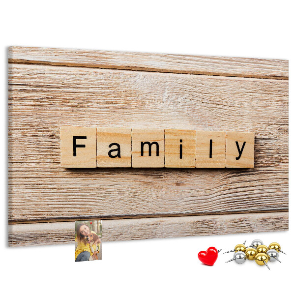 Bacheca in sughero con stampa decorativa di famiglia su sfondo di tavola in legno