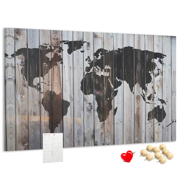 Bacheca in sughero con stampa di una mappa del mondo su sfondo di assi di legno